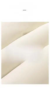 Macro detail of high-quality light beige twill fabric with a smooth and soft texture