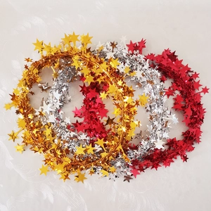 Set of 7.5m Christmas star tinsel garlands in gold, silver and red festive colors