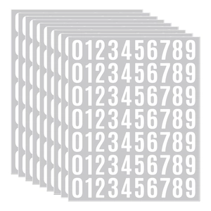 Detail showing 10 sheets of waterproof white vinyl number stickers with 0-9 bold digits