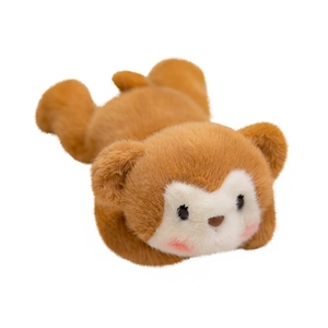 Cute brown plush animal doll in a lying position with soft texture and pink blush details
