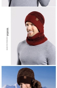 Detail of warm knit winter hat set with fleece lining and leather brand patch