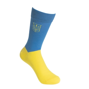 Detail of blue and yellow socks featuring the Ukrainian trident national emblem embroidery