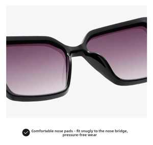 Detail of ergonomic integrated nose pads on large square sunglasses for comfort