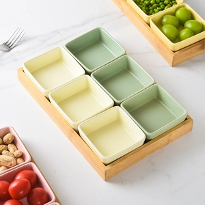 Nordic ceramic snack tray set with six square bowls on a bamboo wooden platter