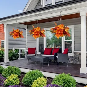 Autumn harvest hanging basket with orange peonies and maple leaves for patio decor