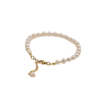 Handmade freshwater pearl bracelet with gold metal beads and adjustable lobster clasp chain