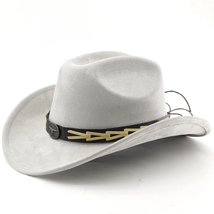Detailed side view of light grey faux suede cowboy hat with vintage bull head buckle
