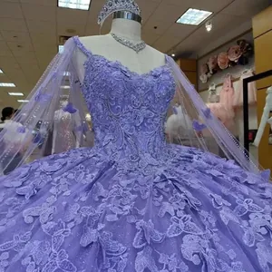 Elegant purple lace ball gown with embroidery and sequins including a mesh shawl