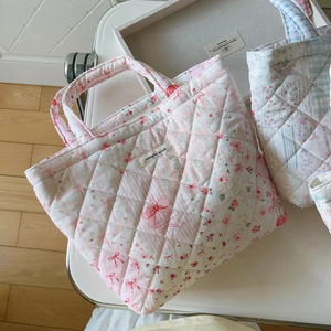 Quilted floral cotton tote bag with Simple Wish label and bow heart patterns