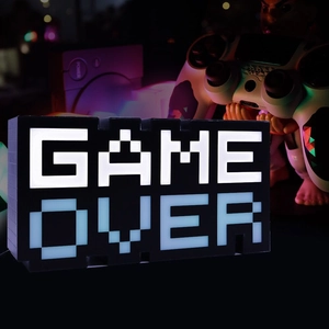 Macro shot of Game Over LED neon sign with vibrant colorful pixel lettering for gaming room