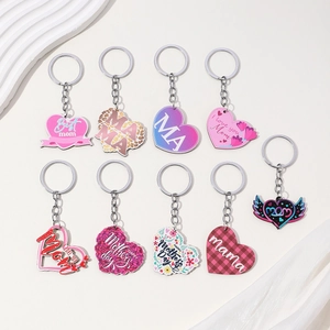 Flat lay of heart-shaped Mother's Day keychains with floral and leopard print patterns