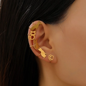 Five-piece set of gold hollow animal-shaped ear cuffs featuring cat and dog paw designs