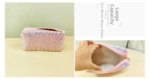 Detailed view of pink sequin makeup bag with pearl zipper and spacious interior layout