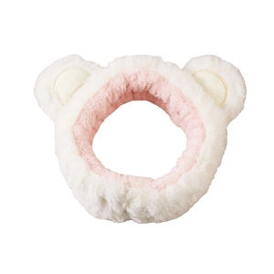 Detail of plush microfiber spa headband with cute bear ears in pink and white