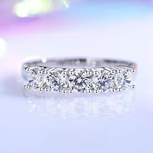 Macro shot of S925 sterling silver V-shape crown ring with 5 sparkling rows of diamonds