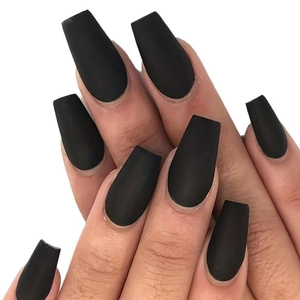 Matte black long coffin press-on nails set on model hands with a minimalist style