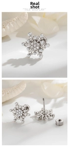 Detail of snowflake pearl ear stud with zircon inlay and secure screw back closure