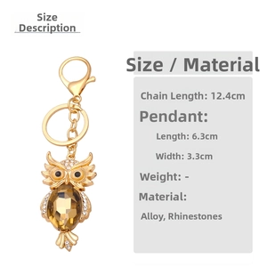 Detail view of owl keychain with brown crystal and rhinestones showing exact dimensions