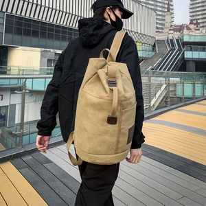 Khaki canvas bucket backpack for travel and outdoor sports with large capacity for men