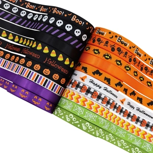Close-up of 10mm Halloween ribbons with assorted patterns and festive holiday prints