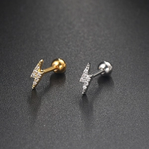 Lightning bolt stud earrings in gold and silver with white zircon for helix piercing