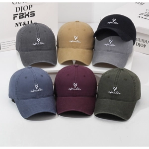 Detailed grid display of vintage cotton baseball caps in multiple colors with embroidery