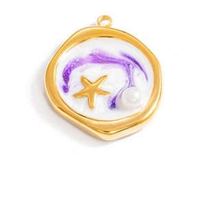 Macro view of gold starfish pendant with white pearl and purple enamel ocean design
