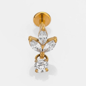 Macro shot of gold stainless steel leaf body jewelry set with clear marquise zircon stones