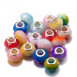 Macro view of colorful faceted crystal beads with silver metal cores for DIY jewelry making