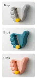 Wall-mounted thumb shaped hooks in grey, blue and pink colors for organizing home mops