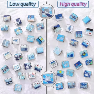 Quality comparison of high-grade blue enamel modular bracelet charms and nautical details