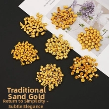Macro view of various ancient gold-plated DIY jewelry beads and spacers for handcrafting