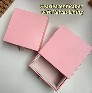 Pink pearlescent paper jewelry drawer box with ribbon pull and soft velvet lining tray