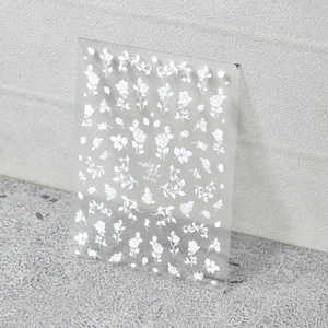 Detail of MS-234 nail stickers featuring white rose flowers and decorative patterns