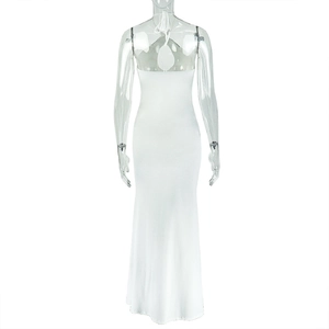 Detail view of the backless design and halter neck ties on a white bodycon maxi dress