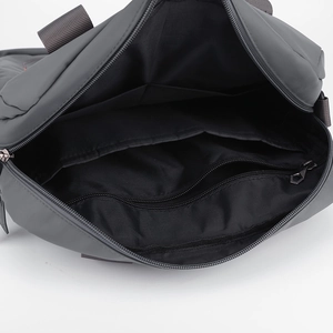 Deep gray nylon laptop briefcase interior showing the main zipper pocket and compartment