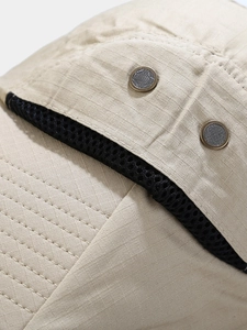 Breathable outdoor sun hat with side mesh vents and khaki ripstop fabric detail