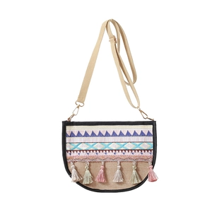 Ethnic semi-circle crossbody bag in beige fabric with colorful tassels and embroidery