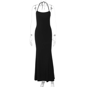 Detailed view of the black slim fit halter neck long dress with backless design