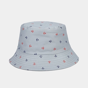 Detail of grey bucket hat with red and blue anchor prints and reinforced stitched brim