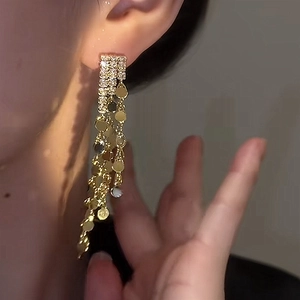 Elegant gold tassel earrings with zircon studs and dangling metallic sequins for women