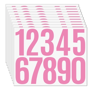 Macro detail of pink waterproof vinyl number stickers 1-0 for mailboxes and sorting