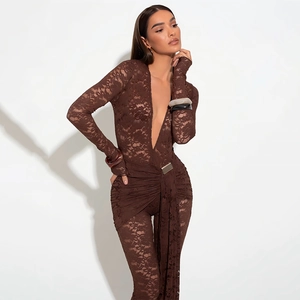 Macro detail of dark brown lace bodysuit with plunging V-neck and ribbon tie waist detail