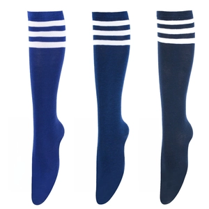 Detailed knit texture of three shades of blue knee-high socks with white athletic stripes