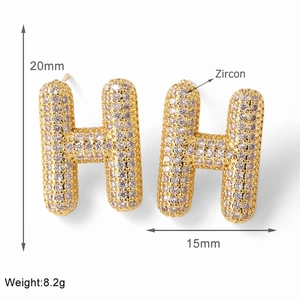 Detailed view of gold-plated letter H stud earring with zircon inlay and 20mm height
