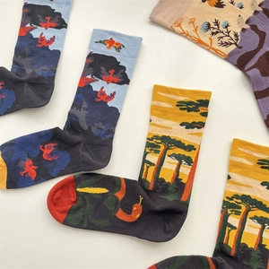 Artistic graffiti crew socks featuring dragon and pine patterns with vibrant colors