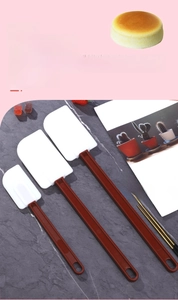 Three-piece heat-resistant silicone cream spatulas with long handles and hanging holes