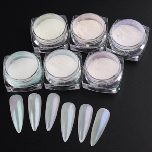 Detail showing 6 jars of white pearl aurora nail powder with multi-color shimmer effects