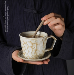 Japanese retro ceramic coffee cup set with rustic texture and wooden stirrer detail