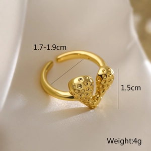 Macro shot of gold plated geometric heart ring with 1.7-1.9cm inner diameter size detail